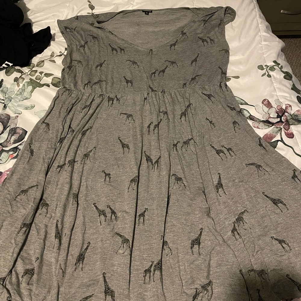 Torrid size 3 dress with giraffe print.excellent used condition